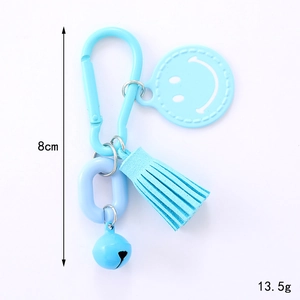 Blue smiley face pendant with tassel, plastic ring and bell, 8cm long keychain accessory