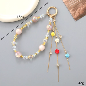 Porte-clés à perles avec fleurs et glands, perles roses et breloques en résine