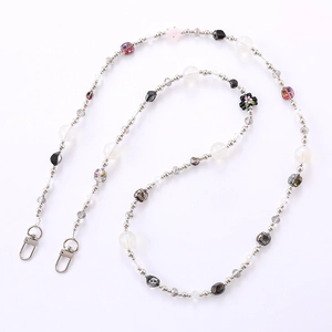 Floral beaded cross-body phone chain with metal lobster clasps and silver flower charms