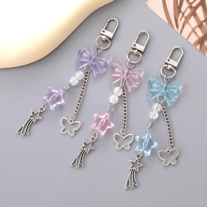 Pendentifs papillon évidés avec étoiles et nœuds en résine pour caméras