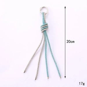 Luxe roman knot phone charm with silver and blue rhinestones and metal snap hook