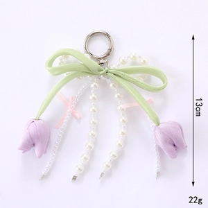 Lanière de téléphone à perles et nœud avec breloques tulipes pour sac de femme
