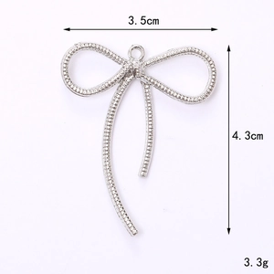 Silver hollow bow ribbon charm dimensions 3.5cm by 4.3cm for DIY accessory making