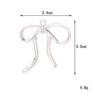 Minimalist silver alloy hollow bow pendant for DIY jewelry and phone accessories