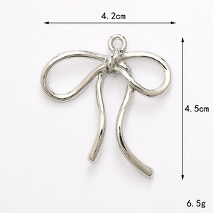 Polished silver ribbon bow pendant with product dimensions 4.2cm by 4.5cm and 6.5g weight