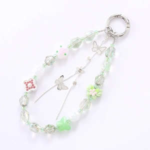 Beaded phone charm with mint green beads, silver butterfly and flower pendants