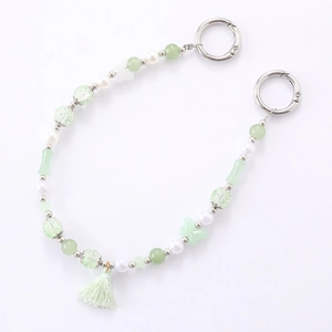 Bamboo-style beaded handbag strap with green tassels and white pearls for women