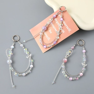 Bijou de téléphone papillon en cristal coloré avec perles irisées et jolis pompons