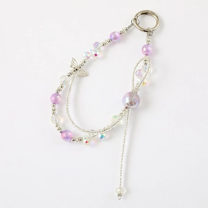 Iridescent beaded phone charm with butterfly pendant and silver spring clasp on white background