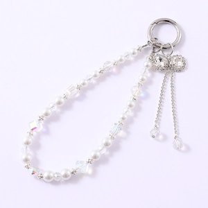 Luxe pearl and crystal beaded keychain with a sparkling rhinestone bow pendant detail