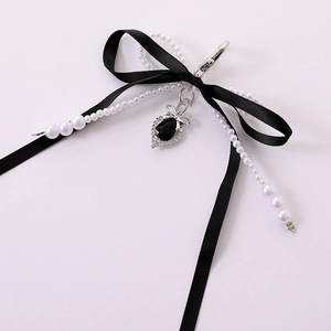 Elegant black bow pendant with imitation pearls and heart teardrop charm for bags and phones
