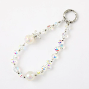 Elegant beaded phone charm with crown pendant and iridescent crystal pearls in white