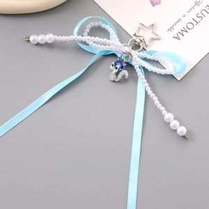 Blue ribbon bow keychain with pearl beads and sparkling fox pendant decoration