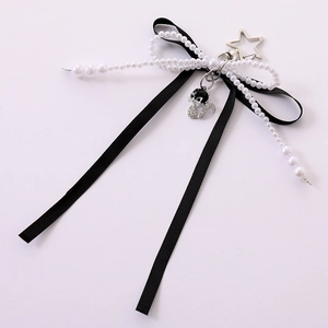 Bow keychain with white pearls, black ribbon, star clasp and crystal cat pendant