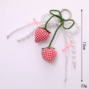 Floral strawberry keychain with faux pearl beads and green suede bow for bags
