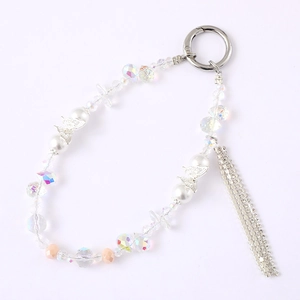Elegant beaded phone charm with rhinestone tassel, butterfly detail and silver clasp