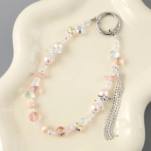 Elegant beaded butterfly charm with pink pearls and rhinestone tassels for phone cases