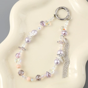 Elegant purple beaded tassel charm with silver butterfly and rhinestones for bags or cases