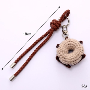 Handmade crochet donut charm with 18cm brown leather strap and silver keychain
