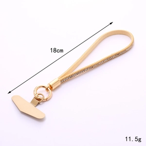 Champagne gold leather wrist strap for phone with rhinestone accents, 18cm long and 11.5g