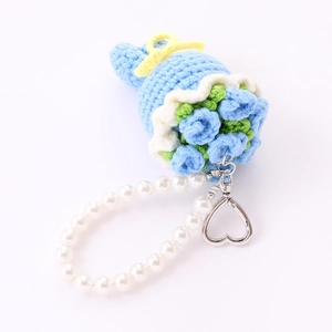 Handmade crochet flower charm with blue petals, pearl chain and heart metal clip