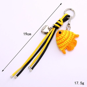 Handmade crochet fish keychain with orange gradient yarn and stylish bicolor leather cord