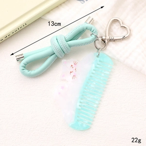 Cute cat-shaped marble acrylic comb keychain with green bow PU strap and heart clasp