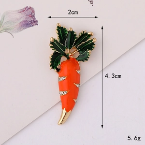 Enamel carrot brooch with white rhinestones and dimensions 2cm by 4.3cm details