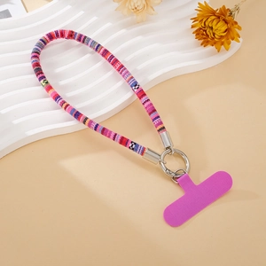 Detail of woven ethnic phone strap with purple silicone pad and silver metal ring