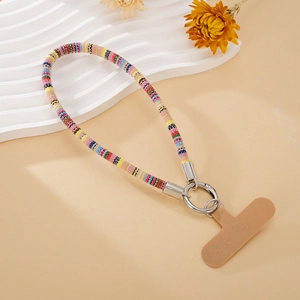 Close-up of colorful braided phone wrist strap with silver clasp and transparent pad