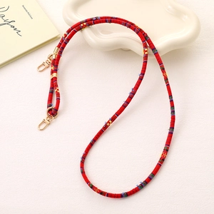 Ethnic style red woven phone lanyard with adjustable gold clasp and colorful strap