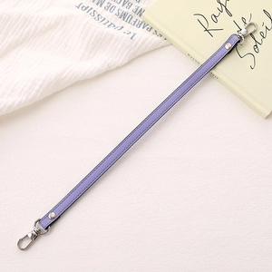 Purple leather wristlet strap with silver metal lobster clasps for handbags and phones