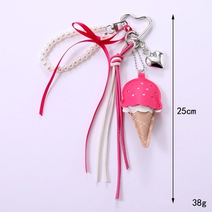 Pink and white leather ice cream bag charm with pearl wrist strap and ribbon bow