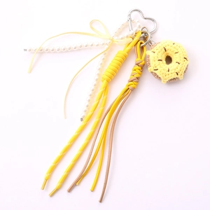 Handmade crochet yellow donut bag charm with pearl chain and heart metal clasp