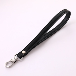 Modern black PU leather wristlet strap with a silver metal lobster clasp and clean stitching