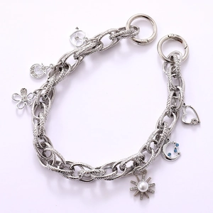 Silver chunky chain bracelet with diamond star pendants and dual spring O-ring clasps
