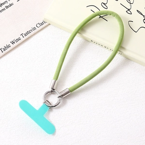 Light green PU leather phone wrist strap with silver metal clasp and T-shaped connector