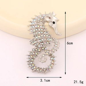 Silver seahorse brooch with colorful aurora rhinestones, measures 6x3.1cm and 21.5g