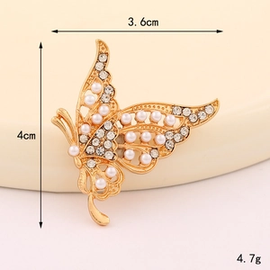 Detail view of crystal butterfly charm with faux pearls and precise dimensions for clogs