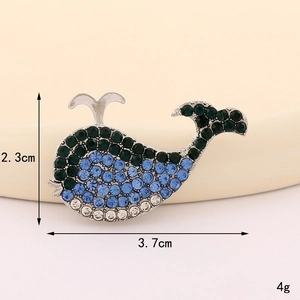 Sparkling silver alloy whale brooch with green and blue crystals, 3.7cm x 2.3cm
