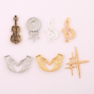 Assorted DIY alloy metal charms with musical notes and instruments for jewelry making
