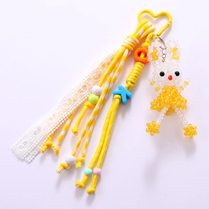 Handmade beaded bunny keychain with colorful dopamine style woven rope and yellow heart clasp