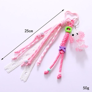 Handmade woven puppy charm with pink heart clasp and colorful beads, 25cm length