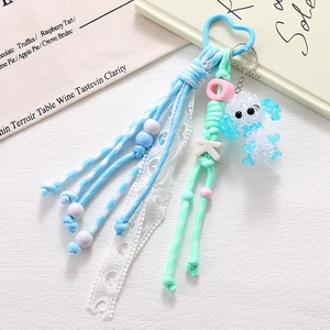 Handmade blue acrylic beaded puppy charm with lace and OK alphabet for bags and keys