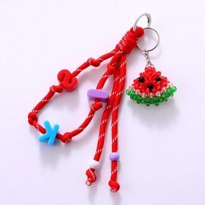 Handmade woven phone lanyard featuring a 3D acrylic watermelon slice and letter beads