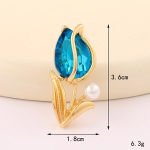 Dettaglio accessorio tulipano con cristallo blu, perla, finitura oro e dimensioni
