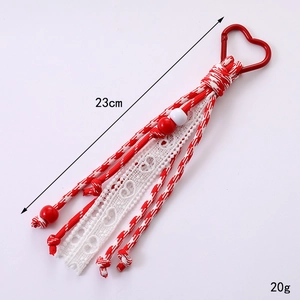 Handmade red and white woven ribbon heart keychain pendant with lace detail and beads