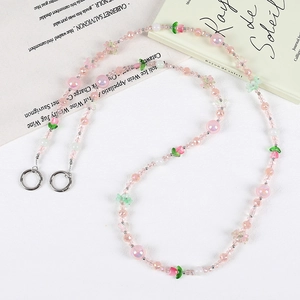 Pink floral beaded phone crossbody chain with transparent beads and silver metal ring