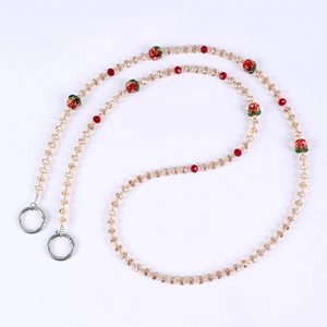 Handmade beaded lanyard with champagne faceted glass beads and strawberry glass charms