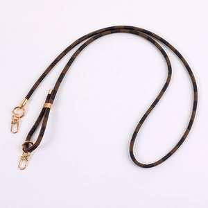 Brown checkered pattern leather crossbody phone strap with gold adjustable metal buckles